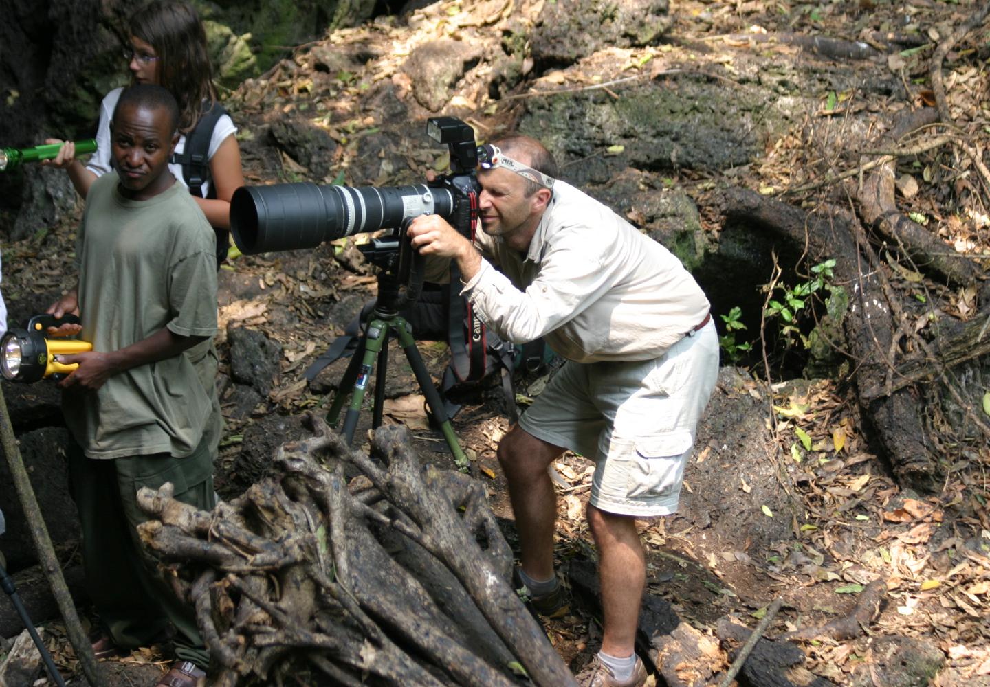 Fotographing in the bat's cave (Queen Elizabeth NP, Uganda)